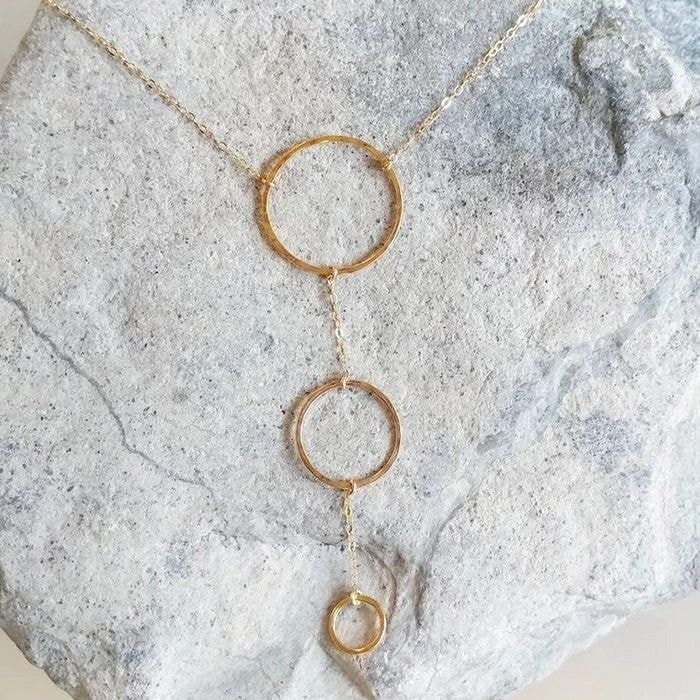Gold circle pendant necklace — fine jewelry handcrafted in Colorado